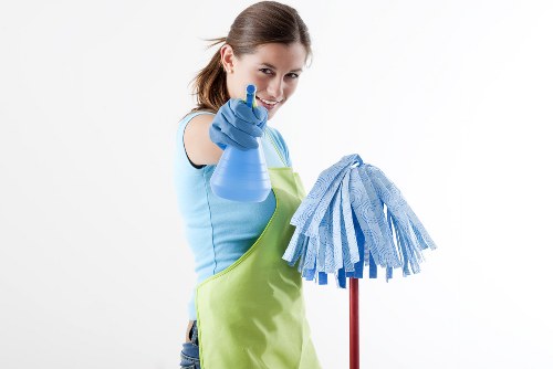 Airbnb cleaner preparing a Kensington short-stay apartment for guests