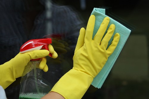 Team carrying out after builders cleaning in a Kensington property