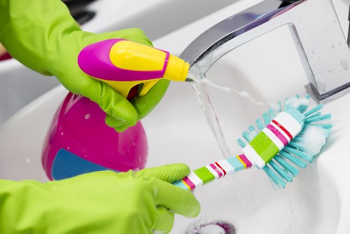Cleaning professional preparing safe carpet cleaning equipment